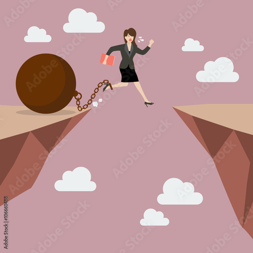 Business woman jumps the abyss with the weight