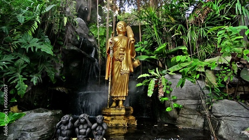 Buddha statue in the mist at golden mount temple Wat Sraket Rajavaravihara at Bangkok, Thailand photo