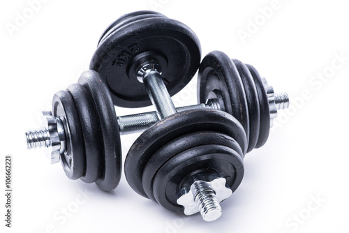 Black dumbbells on white background