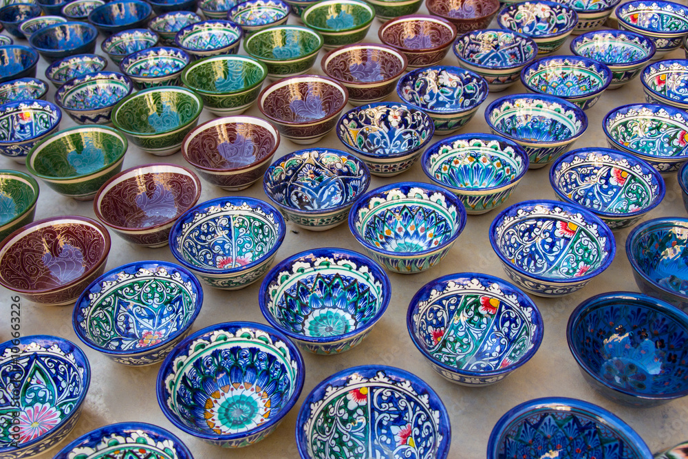 Rows of uzbek cups with traditional uzbekistan ornament, Bukhara