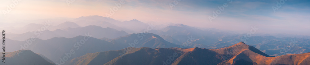 Panorama of Carpathian misty mountains