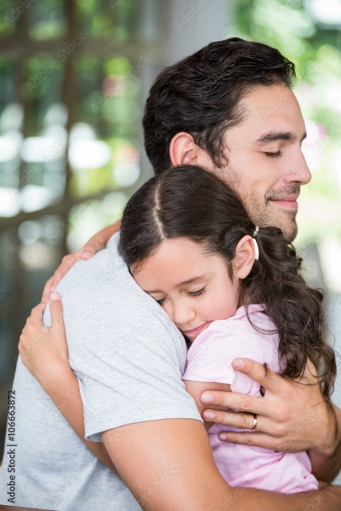 Daughter hugging father Daughter hugging father