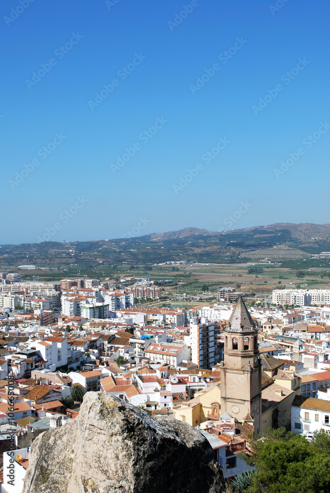 Elevated view over the town rooftops towards the mountains, Velez Malaga.
