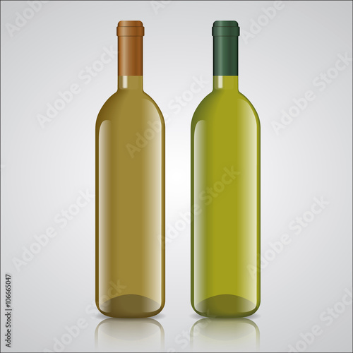 Three bottles of white and red wine with labels