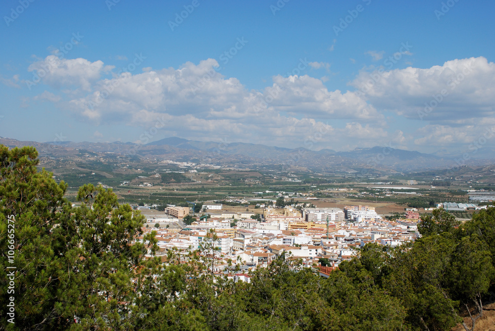 View over the town rooftops towards the mountains, Velez Malaga. View over the town rooftops towards the mountains, Velez Malaga.