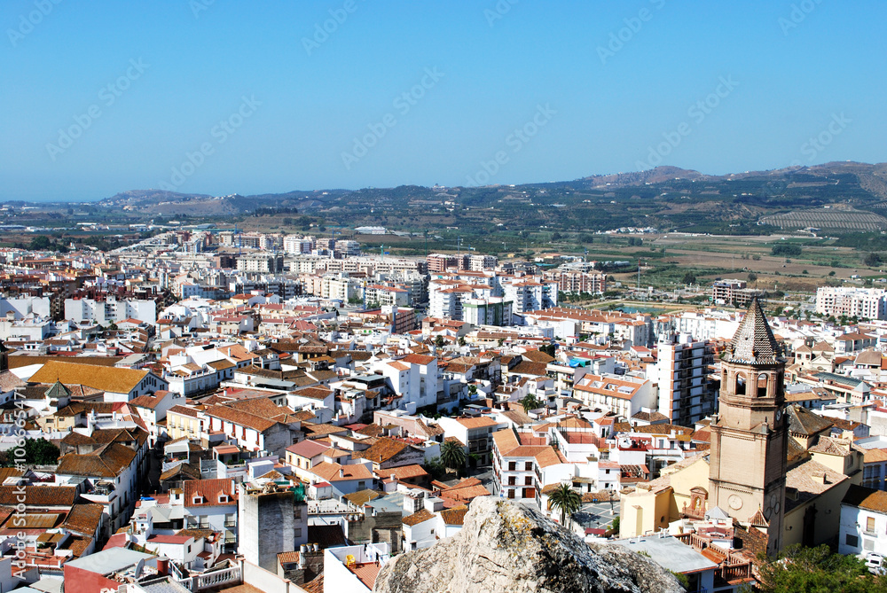 Elevated view over the town rooftops towards the mountains, Velez Malaga.