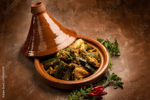 фотографія tajine with meat vegetables and spice