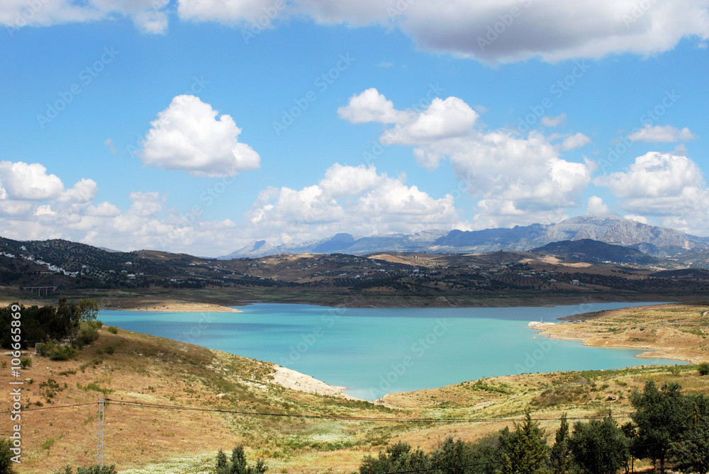 Fototapeta premium View across Lake Vinuela towards the mountains, Andalusia, Spain.