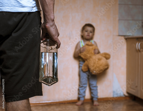 Drunk father and little son with bear