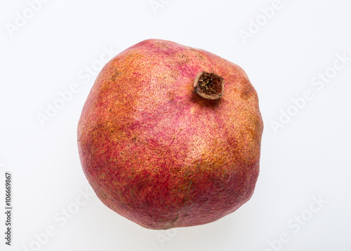 red pomegranate isolated on a white background