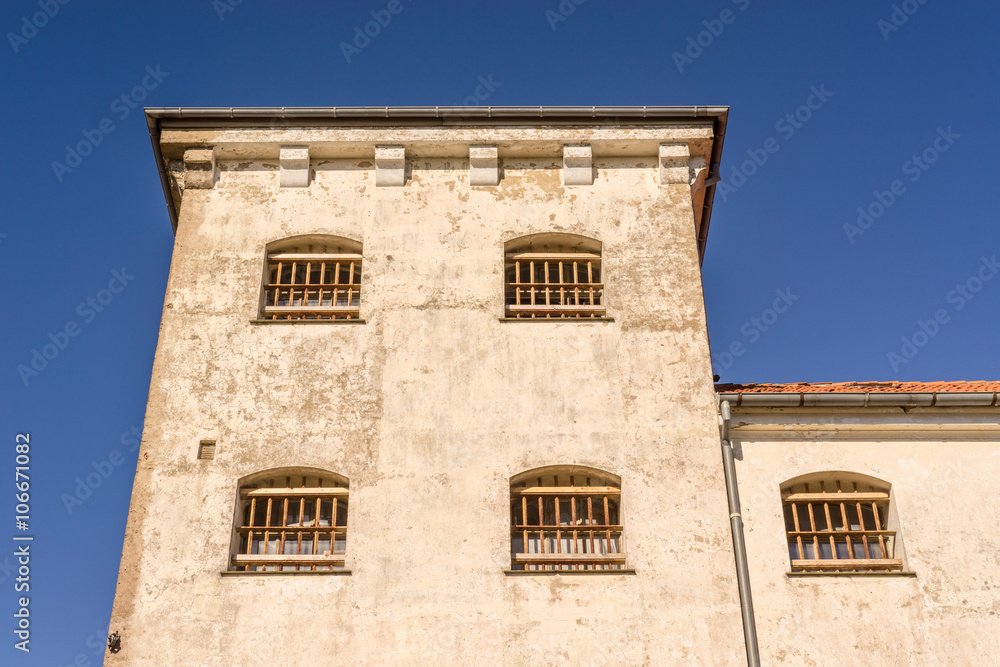 Prison building with bars on windows