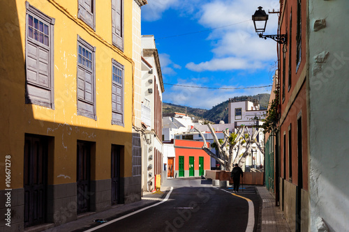 Summer cityscape on tropical island Tenerife, Canary in Spain. Street of old town Guia de Isora.