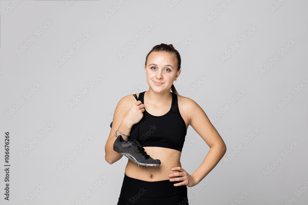 Young caucasian track and field athlete portraits at studio