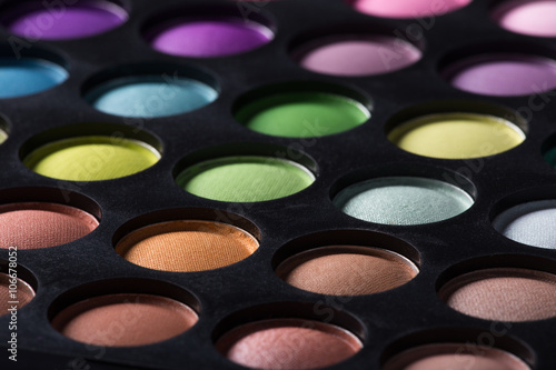 Palette of colorful eye shadows.