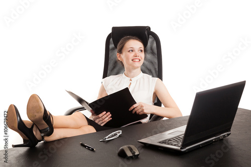 the business woman sits at office table