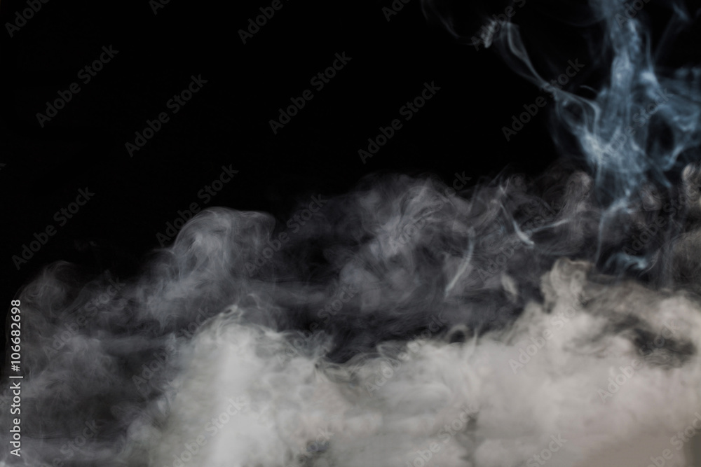 Smoke fragments on a black background Smoke fragments on a black background