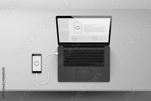 Laptop or notebook black design mock up sync data with smartphone by cable on table illustration
