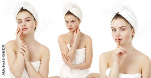 Beautiful young woman posing in white towel