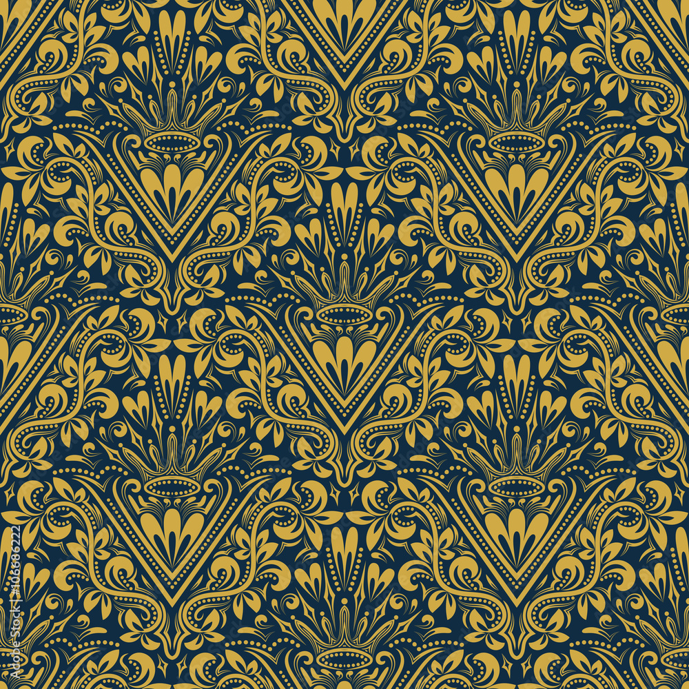 Damask seamless pattern repeating background. Gold blue floral ornament with V letter and crown in baroque style. Antique golden repeatable wallpaper.