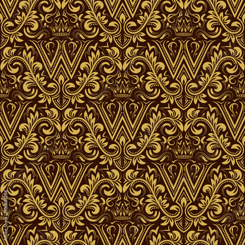 Damask seamless pattern repeating background. Gold brown floral ornament with W letter and crown in baroque style. Antique golden repeatable wallpaper.