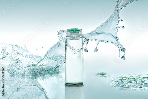 Moisturizing shampoo stands on the turquoise water background