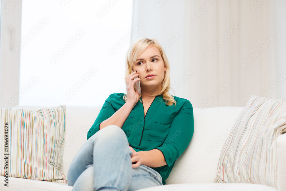 young woman calling on smartphone at home young woman calling on smartphone at home