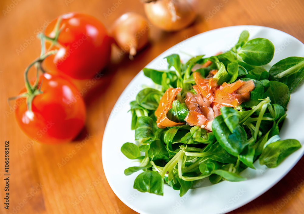 field salad with carrot, tomato and onion