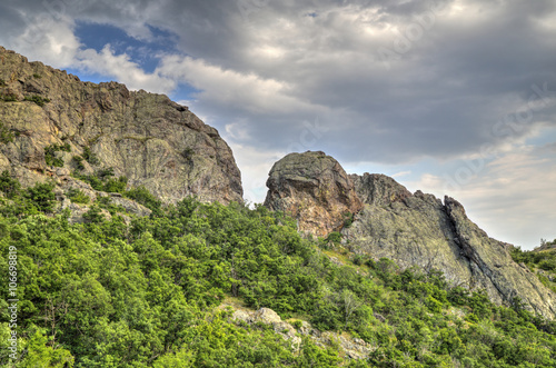 Beautiful mountain landscape with dramatic sky clouds