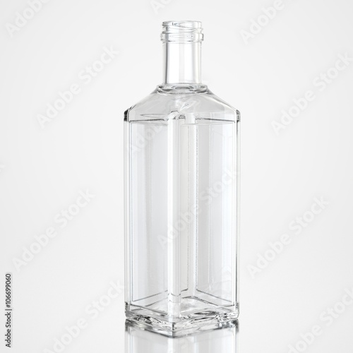 Glass bottle on white background