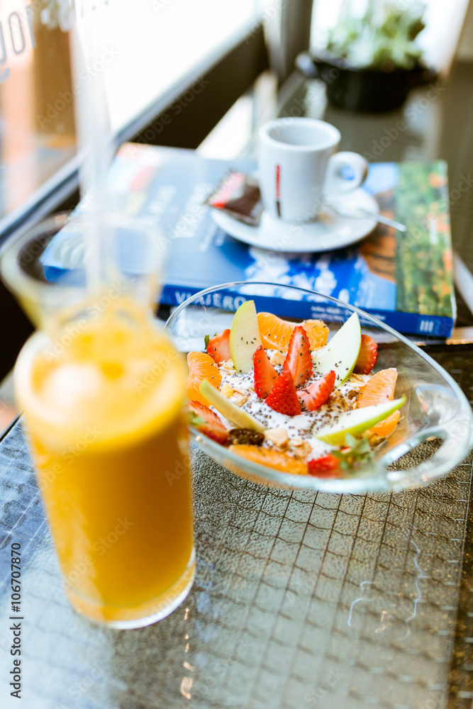 Healthy iogurt with fruits and orange juice in a restaurant. Healthy iogurt with fruits and orange juice in a restaurant.