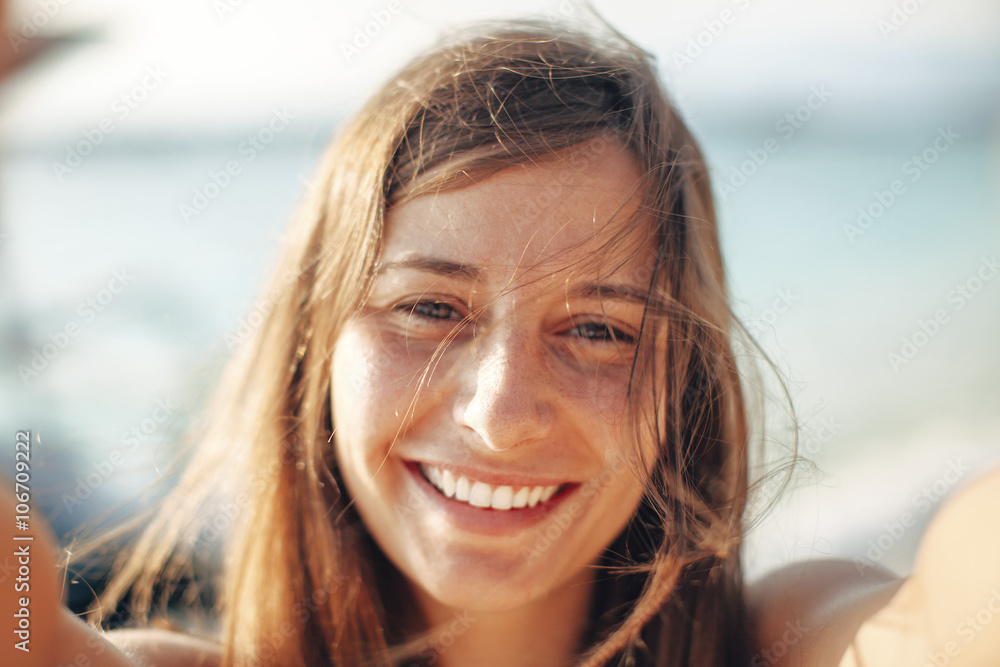 Indonesia, Gili Islands, portrait of happy woman on the beach Indonesia, Gili Islands, portrait of happy woman on the beach