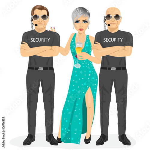 professional security guard standing with arms folded protecting famous woman with a glass of champagne