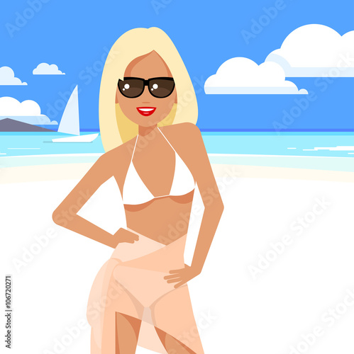 Cute girl in a bikini and pareo on the beach.