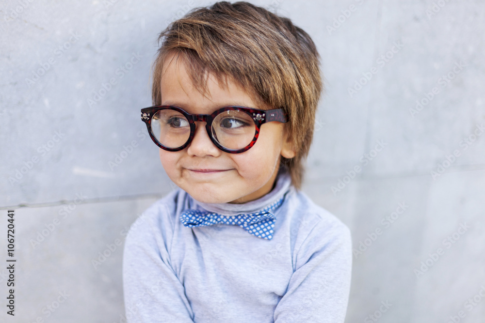 Portrait of smiling little boy wearing oversized spectacles Portrait of smiling little boy wearing oversized spectacles