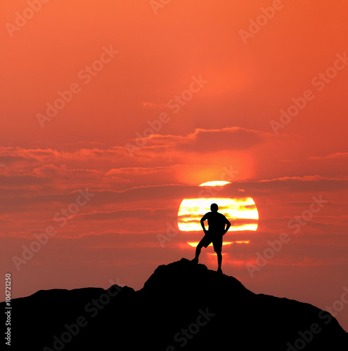 Sunset landscape with silho...