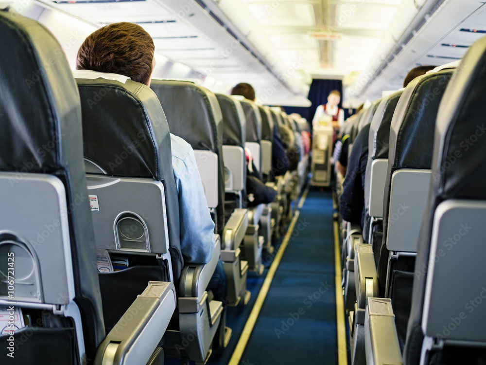 Cabin of passenger aircraft during the flight Cabin of passenger aircraft during the flight