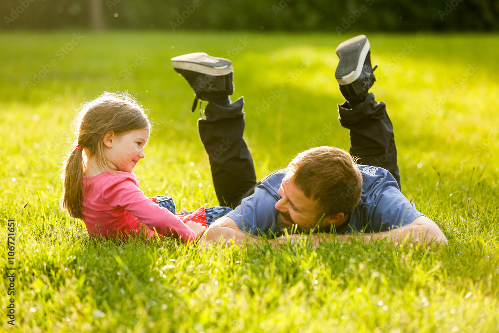 Devoted father and daughter talking, having fun