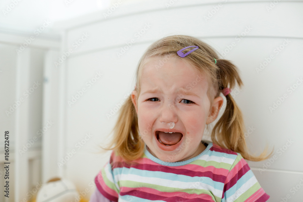 Crying little toddler, having a tantrum