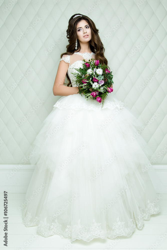 full length view on beautiful woman posing in a wedding dress. wedding makeup and hairstyle with diamond crown, fashion bride model jewelry and beauty female face, bride in luxury wedding dress, full length view on beautiful woman posing in a wedding dress. wedding makeup and hairstyle with diamond crown, fashion bride model jewelry and beauty female face, bride in luxury wedding dress,