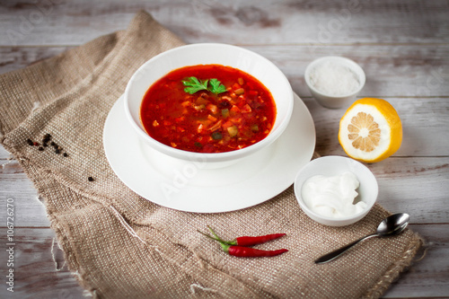 Soup on rustic wood background