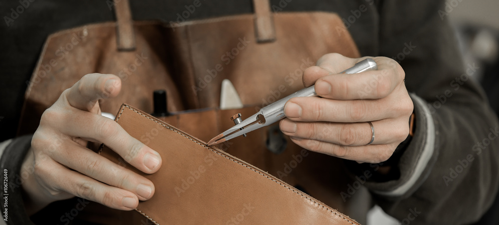 Trunk Maker at work in his luxury leather workshop