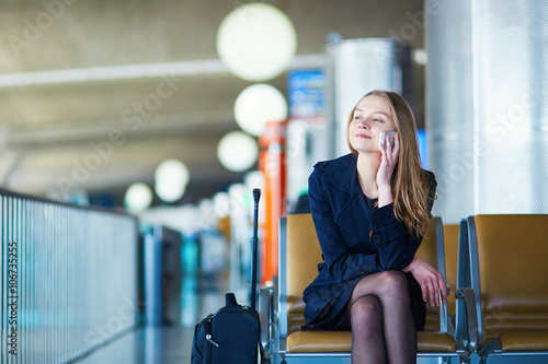 Young female traveler in international airport