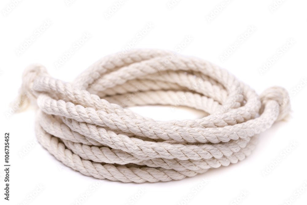 Fototapeta premium Twisted thick rope on white
