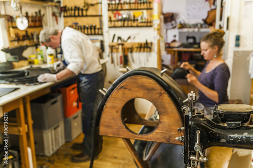 Vaulting belt and leather sewing machine in saddlery