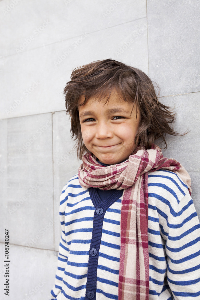 Portrait of smiling little boy wearing scarf Portrait of smiling little boy wearing scarf