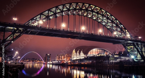 Newcastle Tyne bridge and Gateshead quayside at night photo