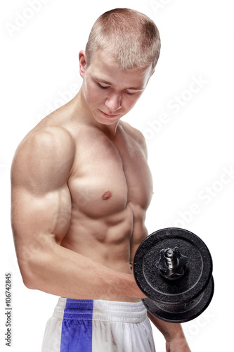 muscular man lifts a dumbbell on a white background