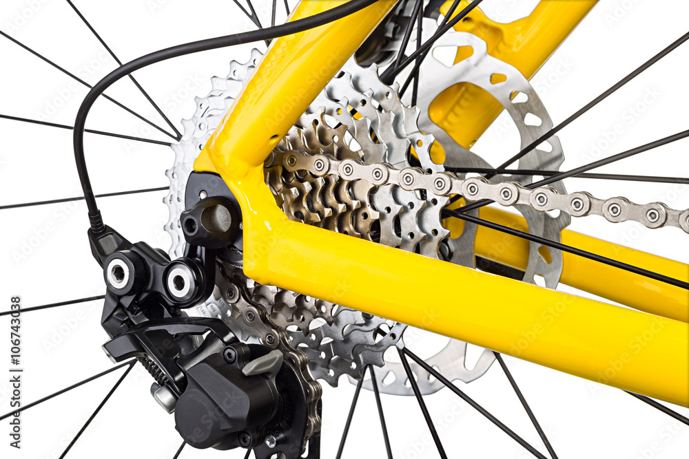 Naklejka premium derailleur mechanism on a bicycle isolated on white background / Schaltwerk an einem Fahrrad isoliert auf weißem Hintergrund