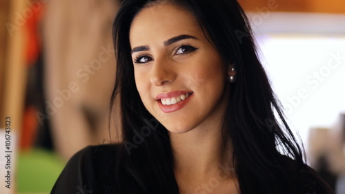 Wallpaper Mural A very beautiful woman looking directly on camera and smiling. Torontodigital.ca