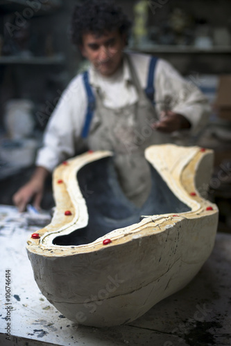 Wallpaper Mural Germany, Munich, Art foundry worker working on casting mould Torontodigital.ca